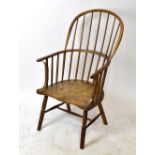 A beech and ash country kitchen chair with hoop shaped back and saddle seat on turned legs, height