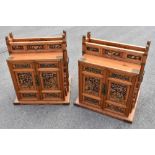 A pair of modern Chinese carved and gilt soft wood marriage chests, each with two doors, height