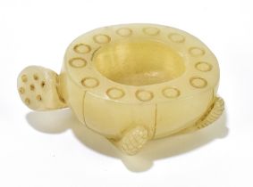 A Chinese pale celadon jade brush washer modelled as a pod, length 6.5cm.