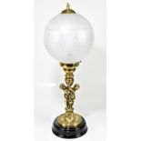 A modern gilt brass lamp in 19th century style, with frosted globe shade, height 66cm.