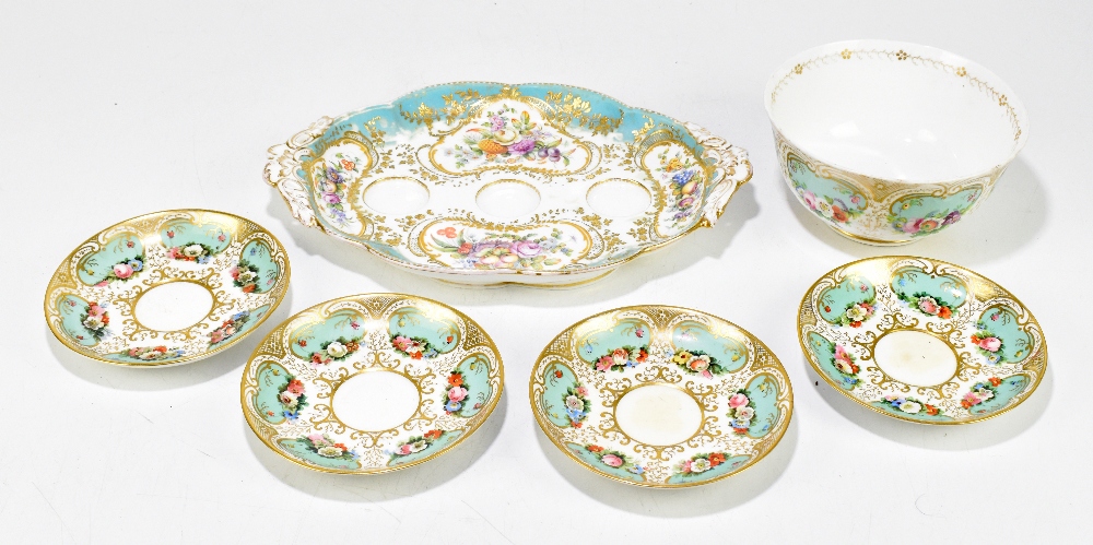 SEVRES; a late 19th century porcelain desk stand of shaped oval form, with integrated handles,