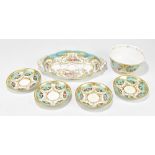 SEVRES; a late 19th century porcelain desk stand of shaped oval form, with integrated handles,