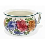 WEMYSS WARE; an unusual chamber pot painted with stylised floral decoration, green signature to