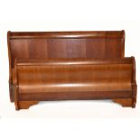 A reproduction sleigh bed (double) with side rails.