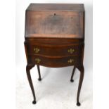 A small reproduction walnut bureau with two drawers and cabriole legs, width 50cm, depth 41cm,