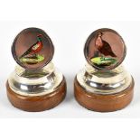 Two Edwardian silver and enamel game bird menu holders, one decorated with a pheasant, one decorated