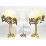A pair of modern gilt metal table lamps, together with a further modern table lamp (3).