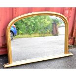 A reproduction gilt framed overmantel mirror, width 119cm, height 77cm.