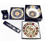 ROYAL CROWN DERBY; a boxed limited edition 1996 Christmas plate, 171/2500, together with four