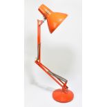 A vintage red painted Anglepoise type lamp, height 79cm.