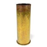 A WWI period Trench Art shell case with engraved decoration, height 23cm.