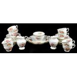 GEORGE JONES & SONS; a Crescent China thirty-four piece part tea service, decorated with floral