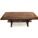 A reproduction oak refectory table on baluster feet, width 183cm, depth 76cm, height 73cm.