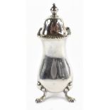 A George V hallmarked silver pepper pot, Chester 1928, weighted 2ozt/63g, height 9.5cm.