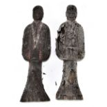 Two unusual charred and petrified wooden figures, length approx. 50cm (both af). Provenance: private