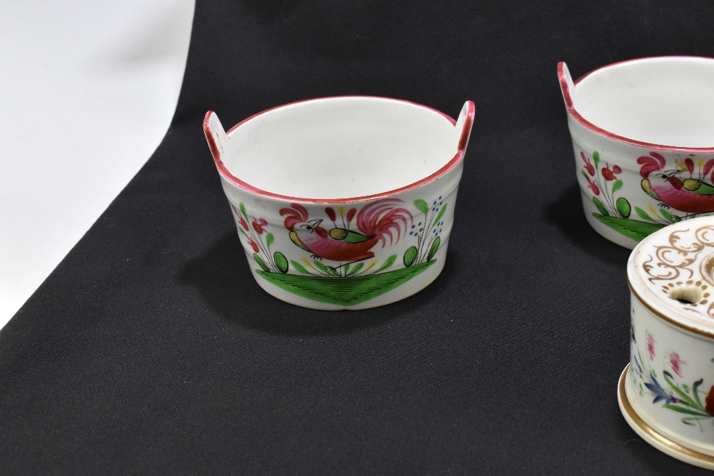 S'ELEUIEUT; a pair of French porcelain butter bowls with hand painted decoration of cockerels in - Bild 2 aus 7