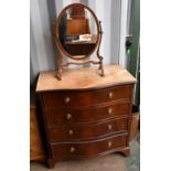 A reproduction four drawer serpentine chest, width 80cm, depth 45cm, height 85cm, and an oval toilet