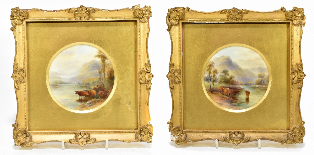 JAMES STINTON FOR ROYAL WORCESTER; a pair of hand painted circular plaques decorated with scenes