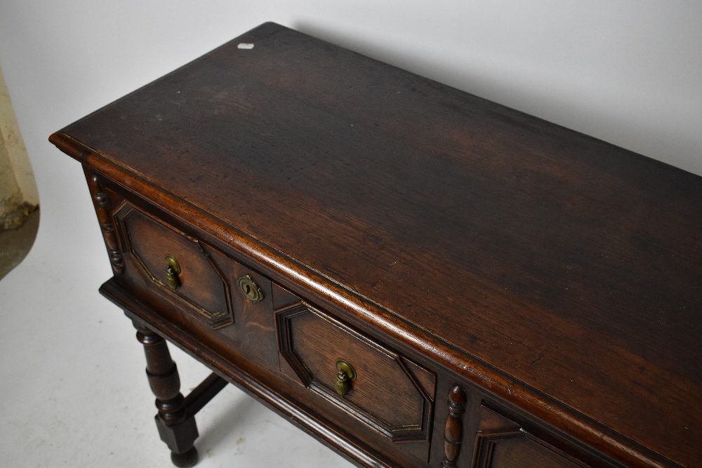 A 1920’s oak dresser base, of 17th century style, with two fielded drawers, on turned and block - Bild 5 aus 5