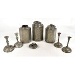 Three 18th century Continental pewter tea canisters and screw covers, one dated 1777 and another