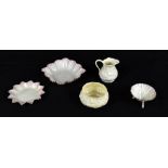 BELLEEK; a group of five ceramic items, comprising a shell shaped conical dish, a jug and sugar