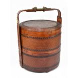 A 19th century Chinese food carrying basket with fitted woven cover, wrap-over bamboo handle and