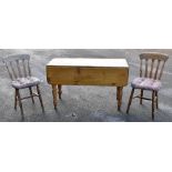 A Victorian pine kitchen Pembroke table with end drawer on turned supports, also a set of four