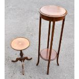 An Edwardian mahogany and boxwood strung circular two tiered plant stand, and a tripod wine table (