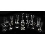 A collection of twelve 19th century and later drinking glasses to include a Masonic toastmaster's