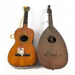 A Spanish acoustic guitar with interior label for Joseph Pages (af) and a lute (af) (2).Additional