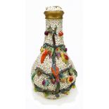 A 19th century German floral encrusted vase and cover, decorated throughout with flowerheads, fruit,