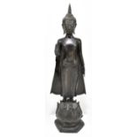 An 18th century Chinese bronze figure of standing Buddha modelled with the Mudra 'Freedom from