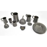 An assortment of 19th century and later pewter including mugs, and assorted plates.