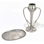 ARCHIBALD KNOX FOR TUDRIC; a pewter dish of oval form embossed with stylised motifs, width 21.5cm,