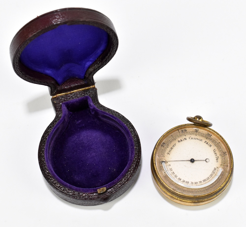 An early 20th century pocket barometer with silvered dial, diameter 45mm, cased.