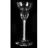 A 19th century cordial glass with pan shaped bowl above a double air twist stem, height 15.5cm.