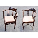 An Edwardian carved mahogany corner chair, with a similar mahogany corner chair (2)