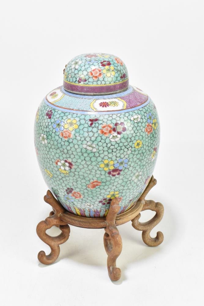 A late 19th century Chinese Famille Rose jar and cover, enamel painted with floral sprays on a - Image 3 of 8