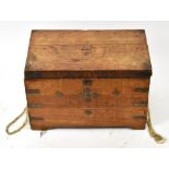 A late 19th century small camphor wood trunk, with later handle, height 38cm, width57cm, depth 33cm.