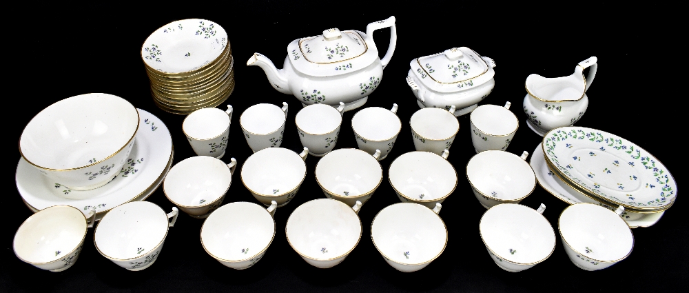 A 19th century floral decorated part tea service.