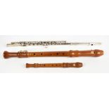 F BUISSON; a chrome plated cased flute, together with two A Adler recorders (3).