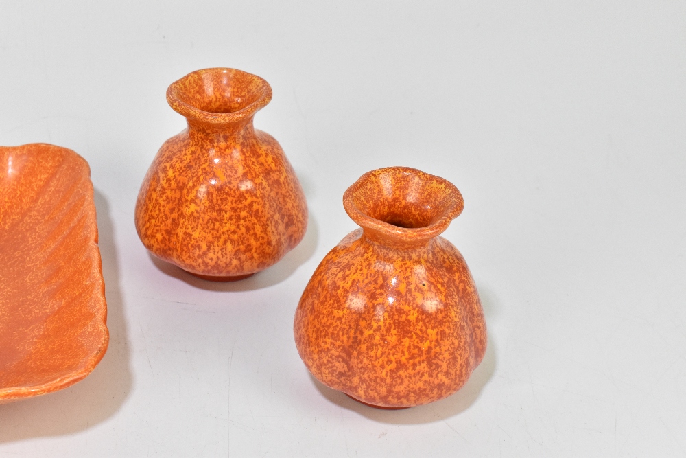 ROYAL LANCASTRIAN; five pieces decorated in an orange vermillion glaze including a pair of squat - Image 4 of 6