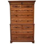 An unusual 19th century mahogany chest on chest, the moulded dentil cornice above two short and