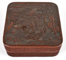 A Chinese red lacquered rounded rectangular box and cover, height 7.5cm, width 17.5cm (lid af)