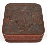 A Chinese red lacquered rounded rectangular box and cover, height 7.5cm, width 17.5cm (lid af)