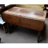 An early 19th century oak drop-leaf Pembroke style table with single end drawer, on turned column