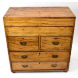 A 19th century teak campaign secretaire chest, with fall front enclosing a fitted interior over