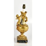 A French Louis XV style gilt metal table lamp, modelled with a cherub, on marble base, height 44cm.