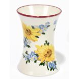 WEMYSS WARE; a weighted vase painted with daisies on floral detail with a red rim, impressed