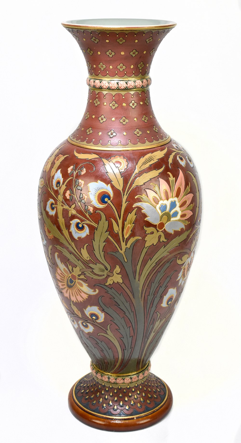 METTLACH; a large German stoneware vase with incised and relief floral decoration, impressed marks